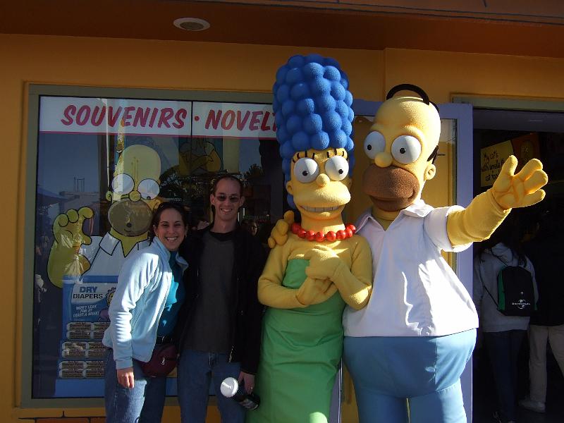 socal074.JPG - The Simpsons Ride!  We waited in line to get our picture with Homer & Marge.  As Mom said, "Two happy couples.".
