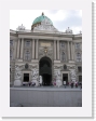 100_3254 * Michaelerplatz.  Entrance to Hofburg is through the archway, surrounded by four statues of Hercules. * Michaelerplatz.  Entrance to Hofburg is through the archway, surrounded by four statues of Hercules. * 1944 x 2592 * (2.15MB)